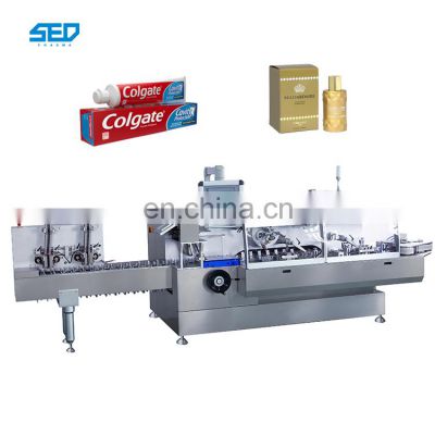 260 boxes / min Multi-functional Automatic Chocolate Toothbrush Toothpaste Cartoning Machine