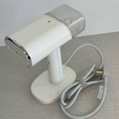 Compact and Space-Saving Handheld Garment Steamer for Small Areas photo-3