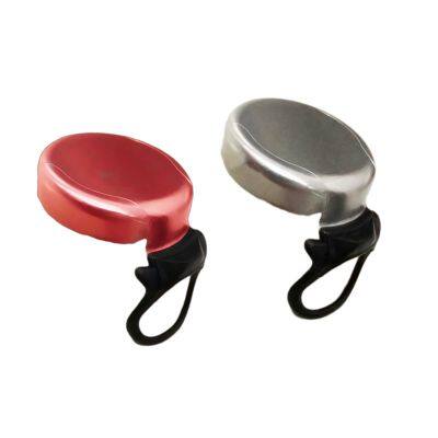 ring pull cap opening with an ergonomically shaped plastic ring