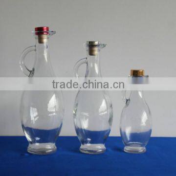 WHOLESALE HANDLE OIL GLASS BOTTLES WITH CORK TOP