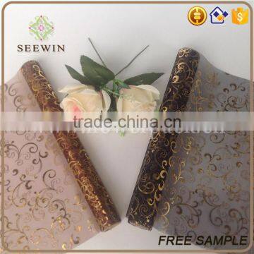 gilding rolls of organza fabric