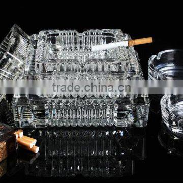 clear glass ashtray with different size square and round shape