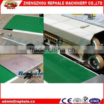 Continuous Automatic Plastic Bag Sealing Machine Price photo-2