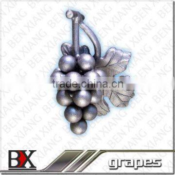 wrought iron decoration of fence and gate forged steel grape