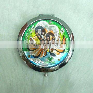 Charms compact mirror with epoxy sticker