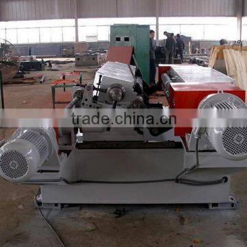 Veneer peeling machine