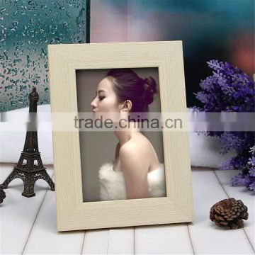 Popular promotional hot plastic photo frame snow globe