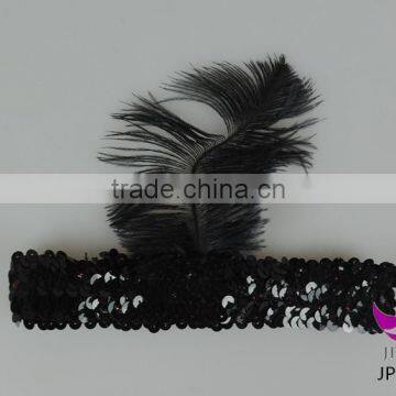 Black sequined hair band with black feather