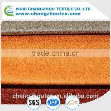 100% POLYESTER SUEDE FABRIC WITH BRONZING AND EMBOSSING