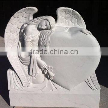 angel honed heart shaped marble tombstone