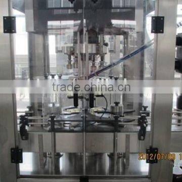 Automatic Rotary Orange Juice Bottle Capping Machine photo-5