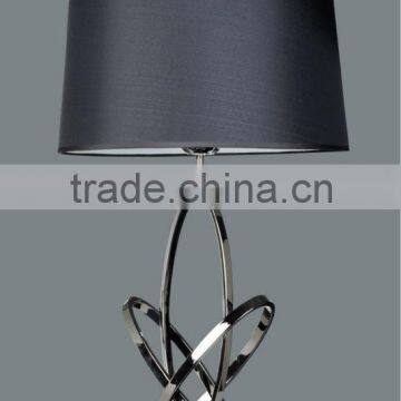 Steel table lamp in chrome with black hard back shade