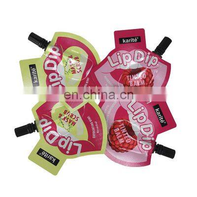 Custom cosmetic foil packaging pouch bag disposable plastic cosmetic sachet package lip shape spout pouch for lipstick packaging