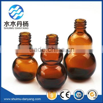 Unique shaped Amber essential oil glass bottles                        
                                                                                Supplier's Choice