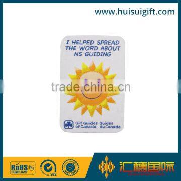 Popular cheap custom design woven smile sun label