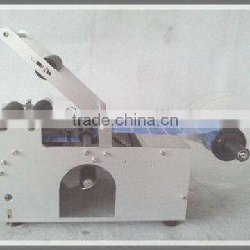 Semi-automatic Round Bottle Glue Labeling Machine LT-50 photo-3