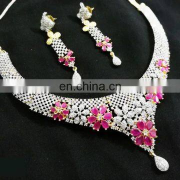 Crunchy Fashionable Pink Color Stone Gold Plated American Diamond Necklace Earrings Set