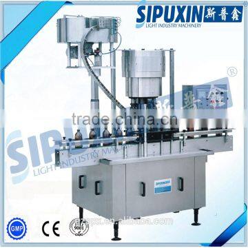 SPX high quality full automatic Medicine bottles capper/ aluminum foil sealing and capping machine / caps machinery sale