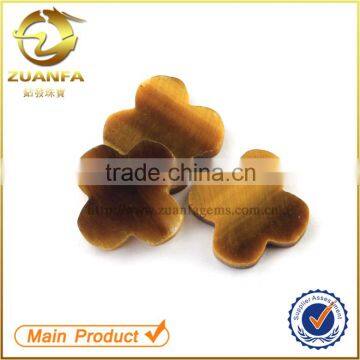 best gemstone wholesaler in wuzhou clover shape synthetic tiger eye stone