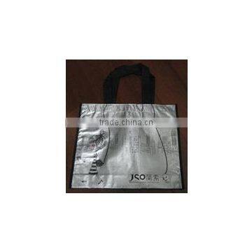 Lamination of aluminum film non-woven bag