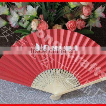 Red hand paper fan made from Zhejiang China