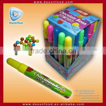 Colored chocolate bean candy in pen bottle