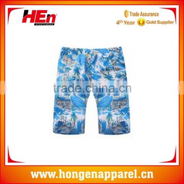 Hongen apparel hot sale fashion OEM mens swimwear surf board shorts sublimation print fabric beach shorts