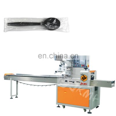 Pneumatic Air Vacuum Bag Roll Flow Pack Type Soup Spoon Coffee Stirrer Automatic Pillow Packing Machine