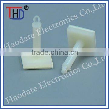 PCB spacer support with adhesive