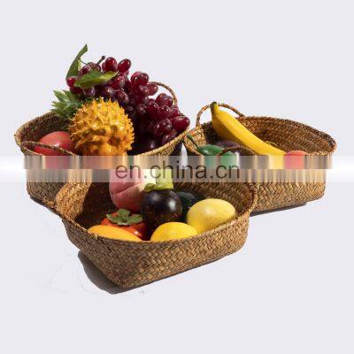 HBK small handmade woven cheap colorful food wedding oval natural sundries seagrass cane rattan storage basket