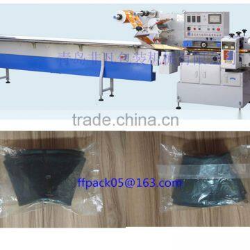 Servo Motor Control Automatic Motorcycle Inner Tube Packing/ wrapping Machine/Horizontal Flow Packaging Machine