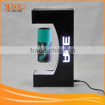 Magnetic levitation acrylic display shelf with LED,rotating cosmetics.shoes.mobile phones.etc