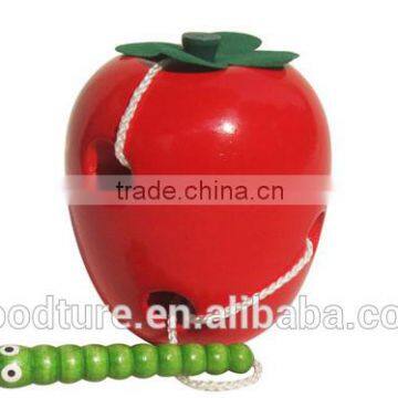 Wooden Caterpillar Eating Red Apple photo-6