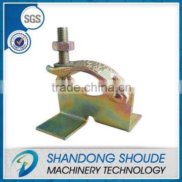 scaffold board retaining coupler for construction scaffolding pipes