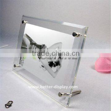 clear acrylic picture frame with metal stand