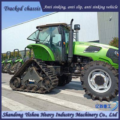 Agricultural tractors modified with triangular track wheels for paddy field operations to increase power