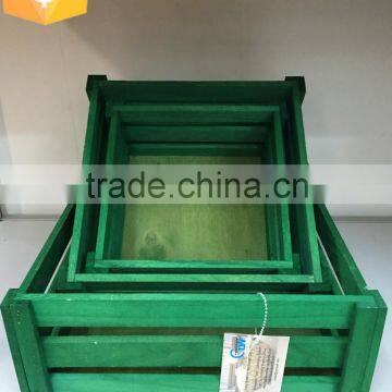retangular green wood crates