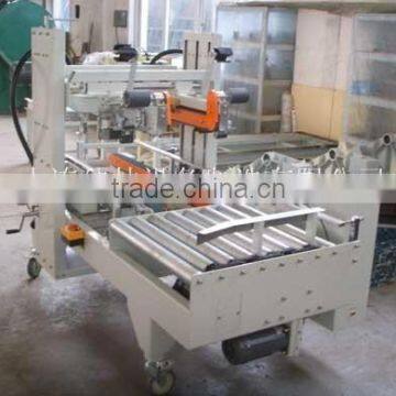 Semi automatic carton packing machine