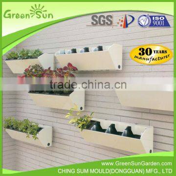 Plastic wall mounted plant and indoor flower pot holder with metal rack
