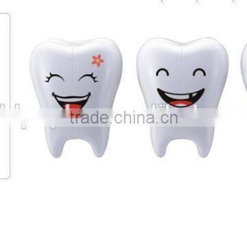 Single tooth shaped plastic toothbrush holder