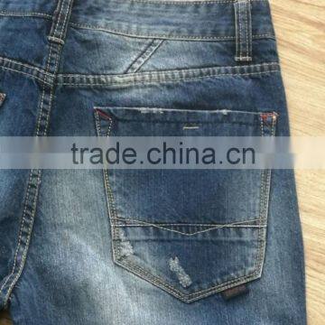 GZY Men's Basic Ripped Slim Fit Jeans Machine With Light Ripes Scratches For South Aerican Stock photo-5