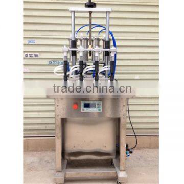 four heads vacuum perfume packaging machine