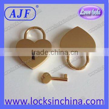 Heart shaped lock and key with gold color