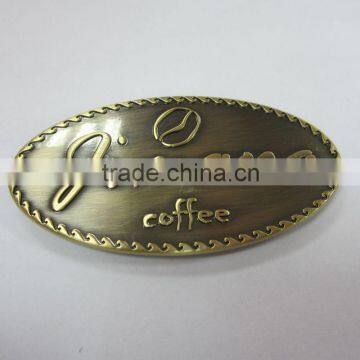 metal scutcheon for coffee house