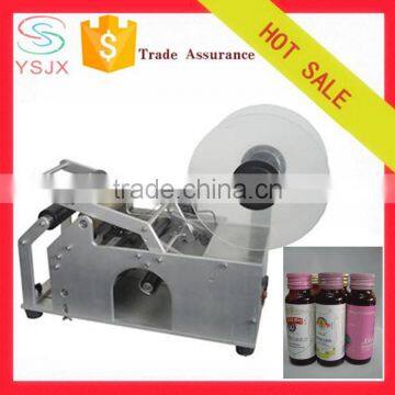 Manual Adhesive Round Bottle Stick Labeling Machine Label Applicator Machine