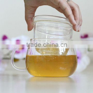 Pyrex glass tea Cup with strainer