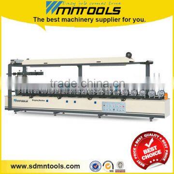 Wood profile wrapping machine