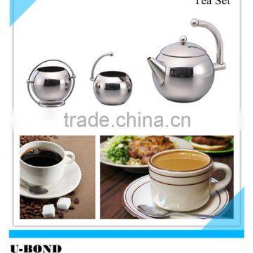 Stainless steel upswept handles and flat bottomed tea set