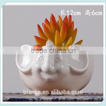 white ceramic animal shape big flower planter