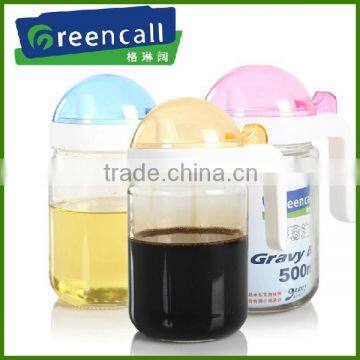 Glass oil pot with handle and lid